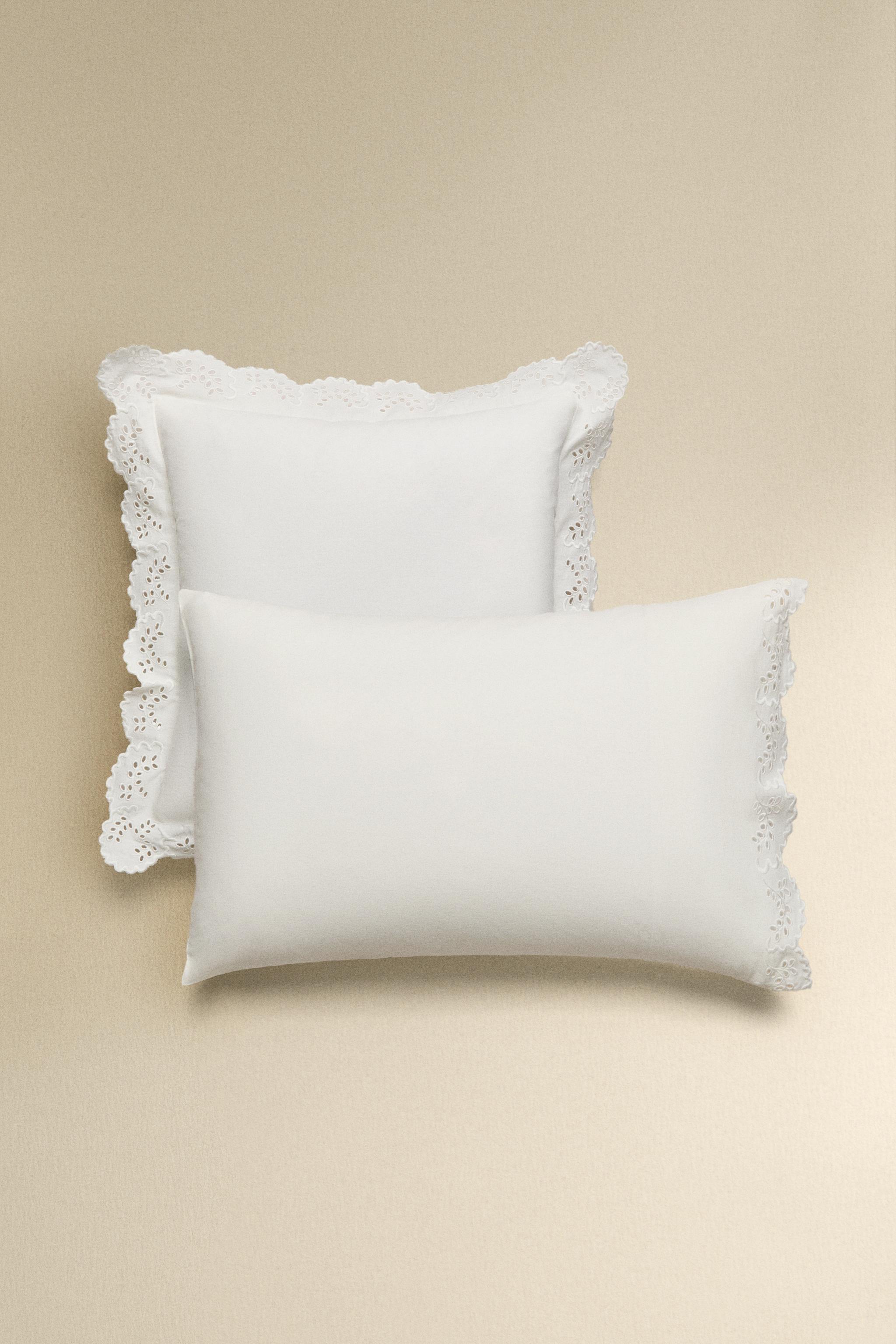 TAIE D’OREILLER BRODERIE FESTON
